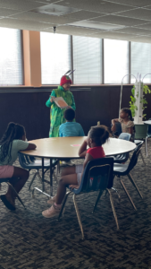 THe Very Hungry Caterpillar Court Street Mission Team at Boys and GIrls Club. Cookies,, Anne Langley dressed as the Caterpillar and reading the story